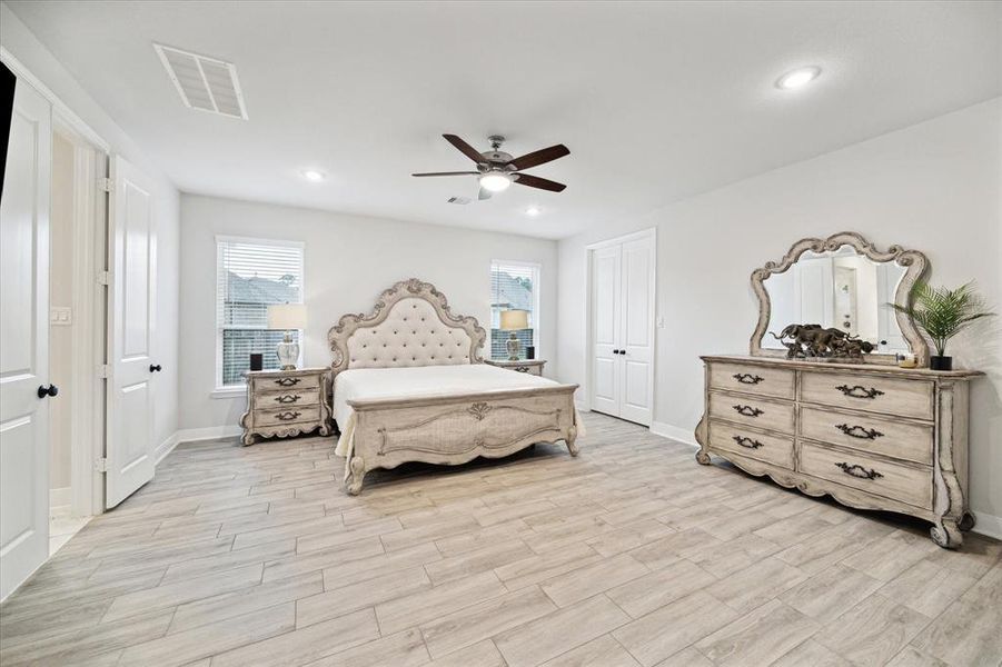 Expanded second primary bedroom on the first floor. Featuring two double walk in closets and ensuite bathroom with an 11'x5' roll in wheelchair accessible shower.