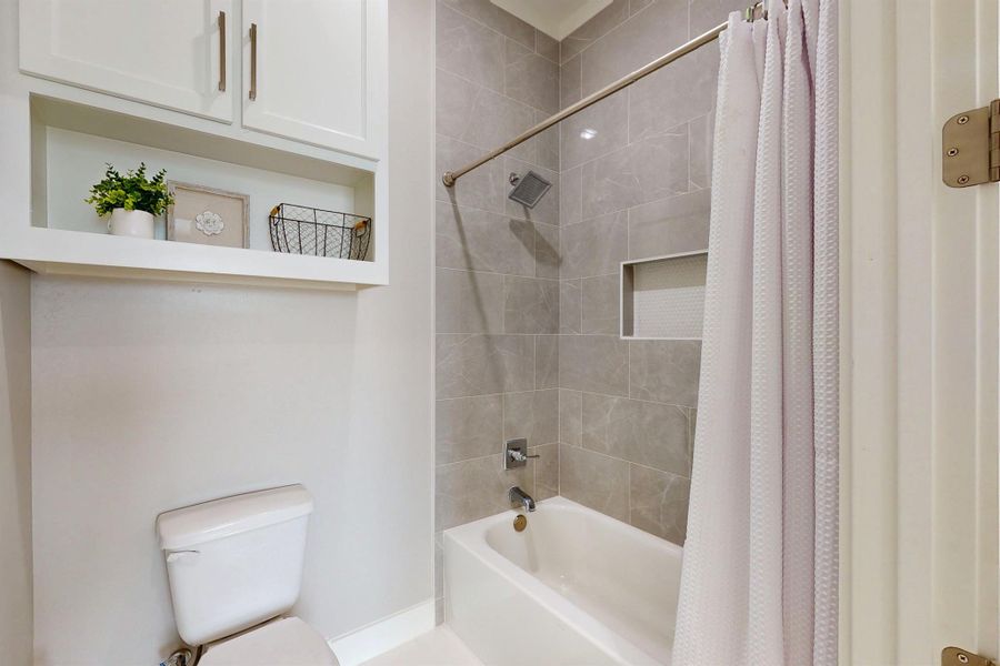 Premium Finishes: Waterproof wood-look vinyl plank flooring throughout, with exquisite floor-to-ceiling custom tile in all showers and wet areas.