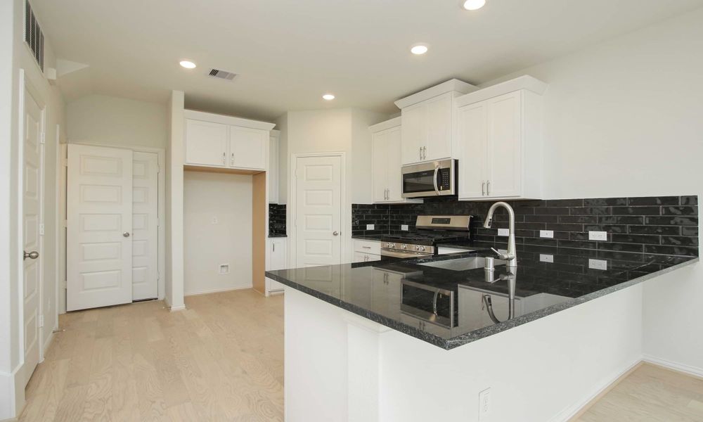 Representative furnished interior of a home built from the Lexington Series - Addison by Brightland Homes in Beamer Villas, Friendswood (Image 19). Representative furnished interior of a home built from the Lexington Series - Addison by Brightland Homes in Beamer Villas, Friendswood (Image 19).