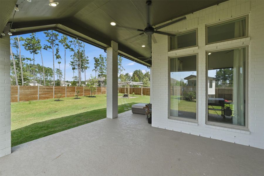 Plenty of shade and room on this upgraded extended back patio