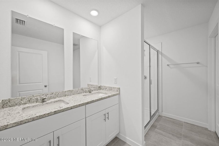 Furnished interior view inside a new home in Lakes at Bella Lago – Classic Series, Green Cove Springs (Image 9).