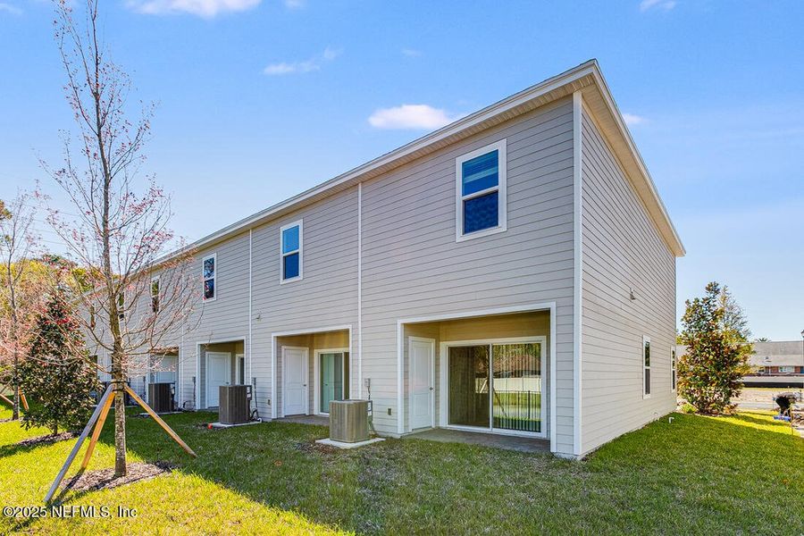 Front exterior of a new home in Sabal Terrace, Jacksonville, FL, highlighting curb appeal (Image 2). Front exterior of a new home in Sabal Terrace, Jacksonville, FL, highlighting curb appeal (Image 2).