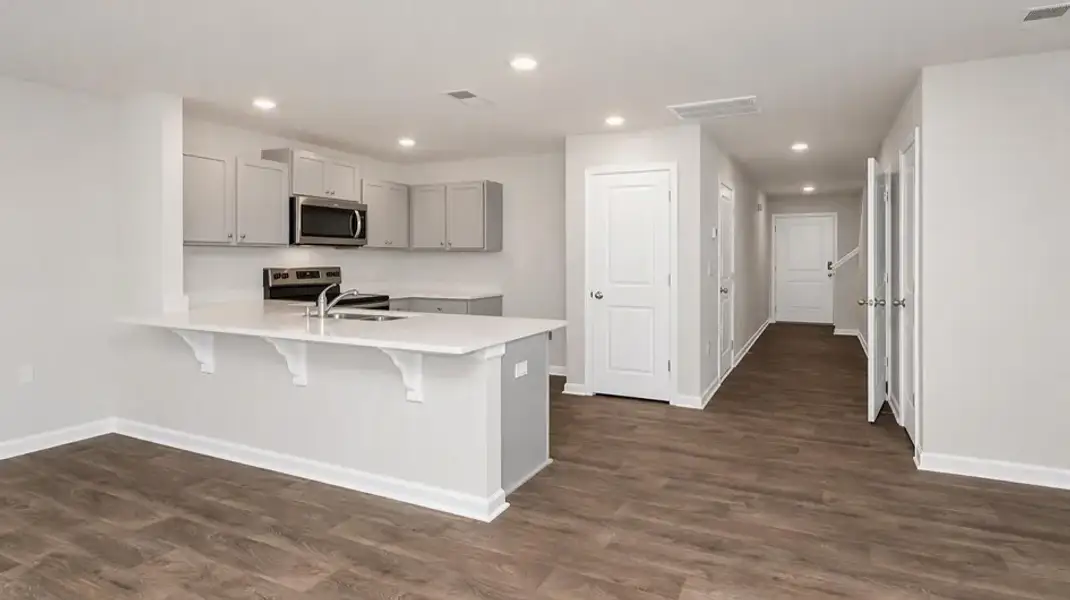 Furnished interior view inside a new home in Hunter's Branch Townhomes, Hopkins (Image 4).