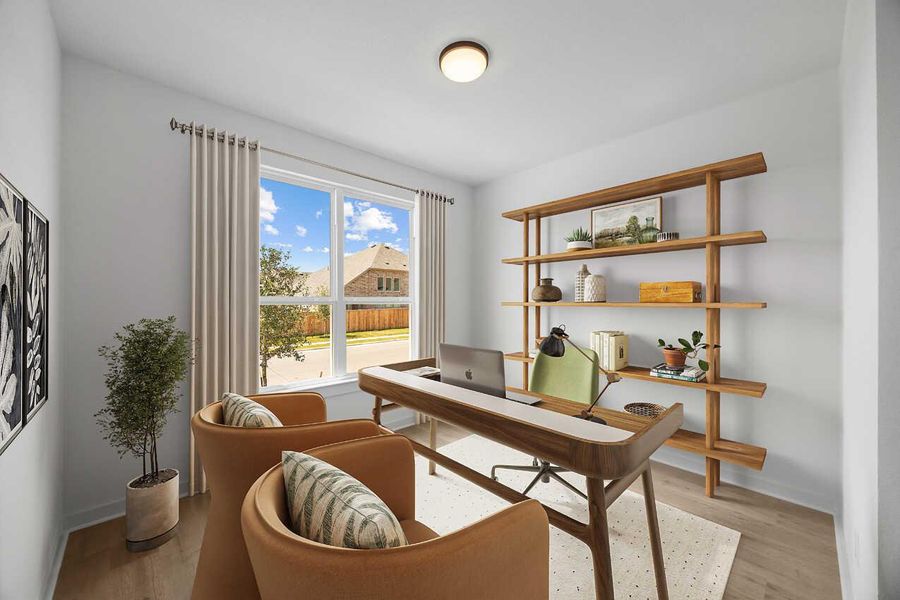 Office area with light wood-style flooring Office area with light wood-style flooring