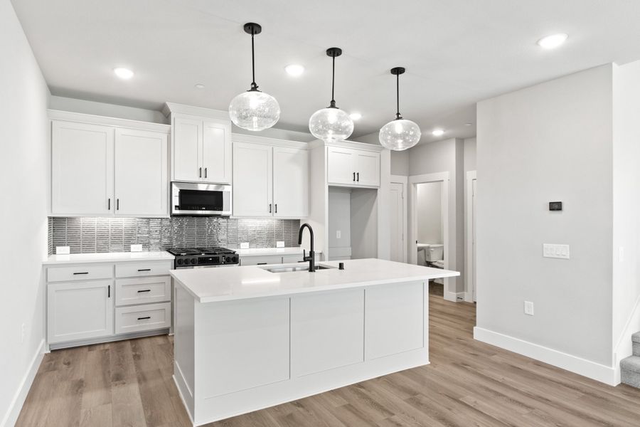 Furnished interior view inside a new home in The Tribute, The Colony (Image 8).