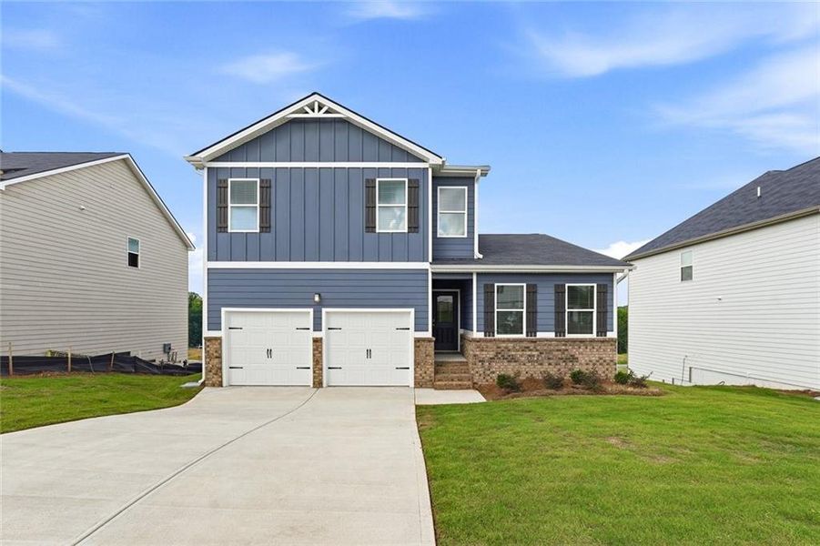Front exterior of a new home in Jones Crossing, Hogansville, GA, highlighting curb appeal (Image 2). Front exterior of a new home in Jones Crossing, Hogansville, GA, highlighting curb appeal (Image 2).