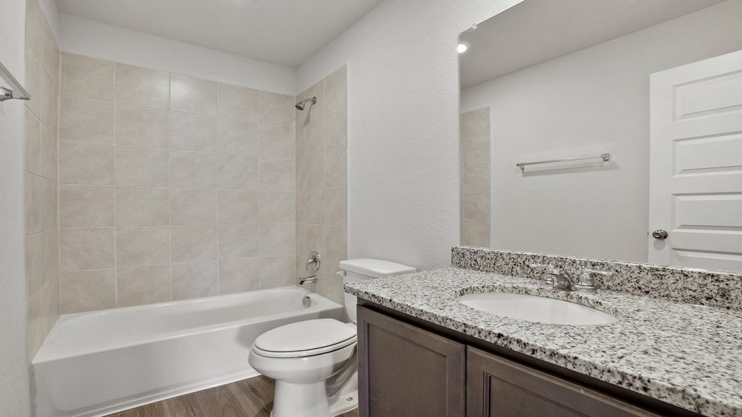 Furnished interior view inside a new home in Hunters Ranch, San Antonio (Image 11).