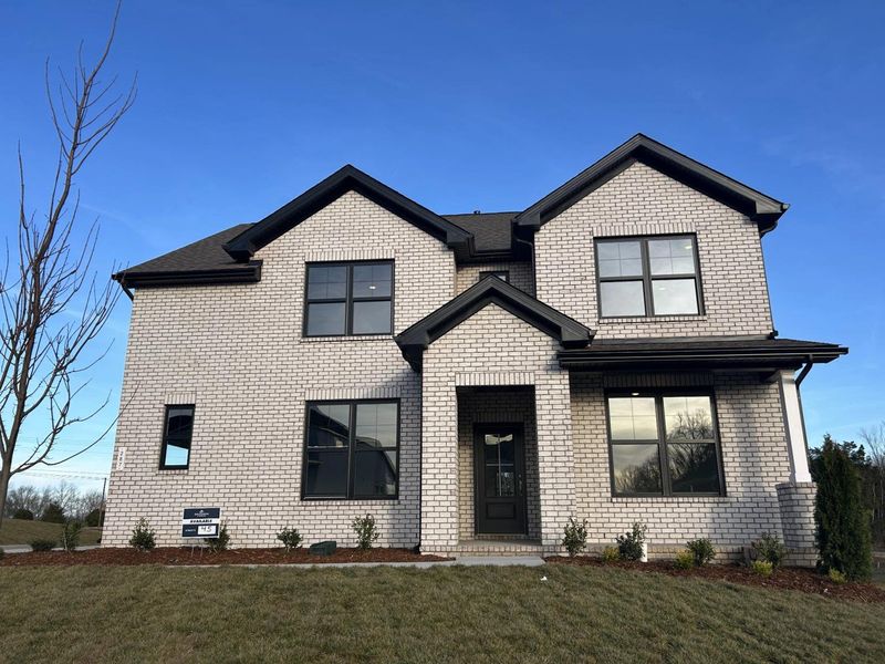 Front exterior of a new home in Benders Cove, Mount Juliet, TN, highlighting curb appeal (Image 1). Front exterior of a new home in Benders Cove, Mount Juliet, TN, highlighting curb appeal (Image 1).