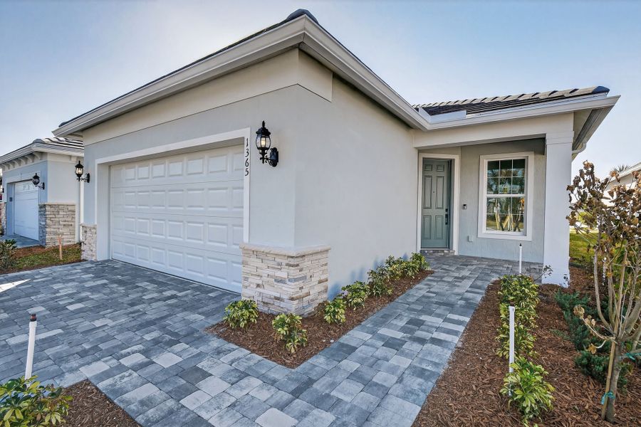 Exterior details and patio area of a home in Costa Pointe, Vero Beach (Image 27).