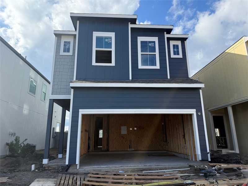 Three story home with 3 beds, 2.5 baths, and 2 car garage