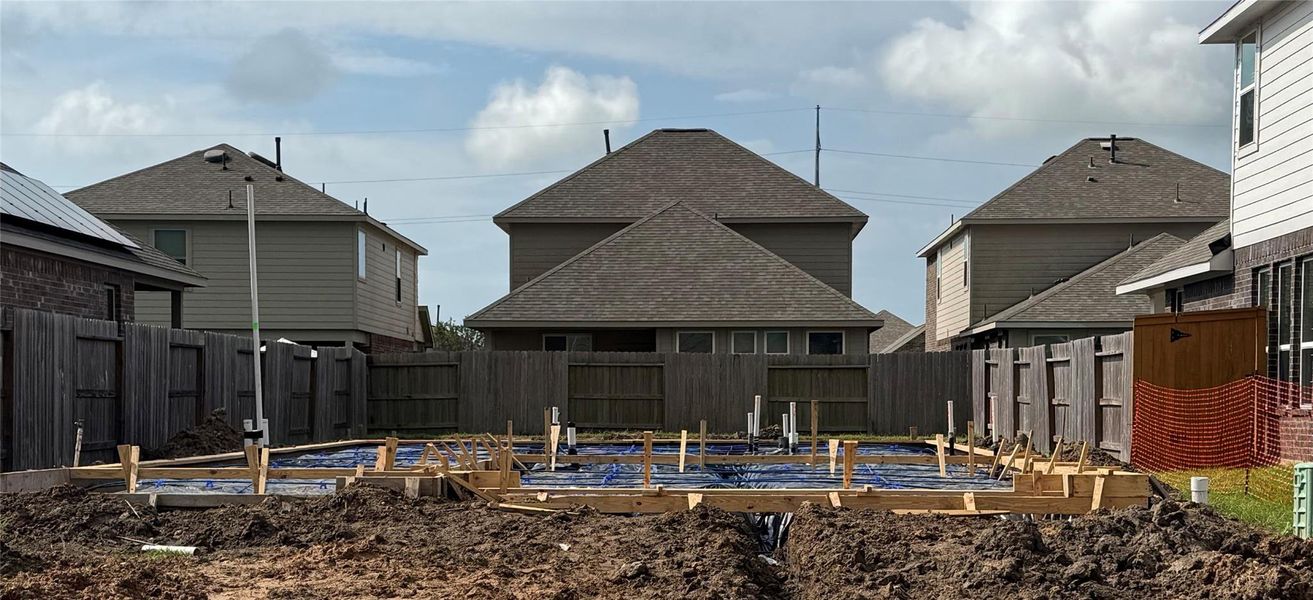 Front exterior of a new home in Lago Mar 40' at Lago Mar, Texas City, TX, highlighting curb appeal (Image 2). Front exterior of a new home in Lago Mar 40' at Lago Mar, Texas City, TX, highlighting curb appeal (Image 2).