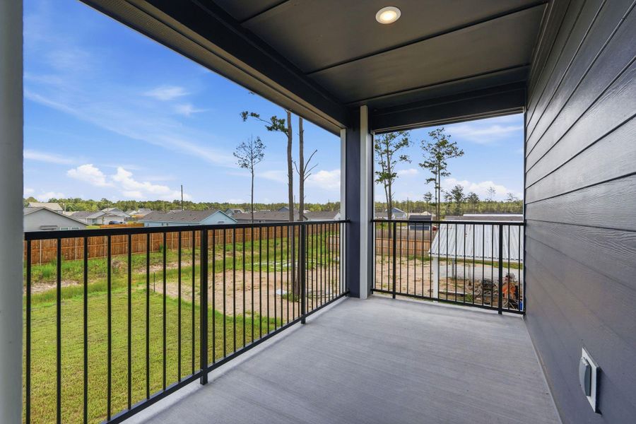 Exterior details and patio area of a home in , Conroe (Image 4).