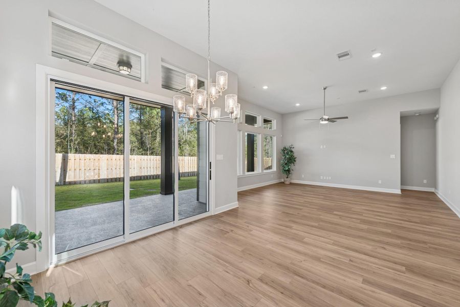 EXAMPLE PHOTO:Large Living area provides adequate space to enjoy!  12 ft ceilings.