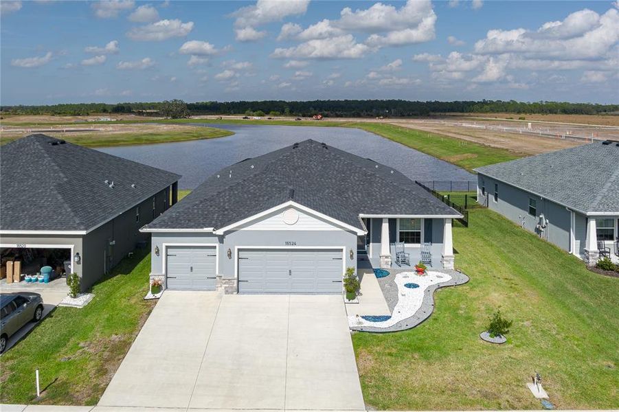Front exterior of a new home in , Parrish, FL, highlighting curb appeal (Image 20). Front exterior of a new home in , Parrish, FL, highlighting curb appeal (Image 20).