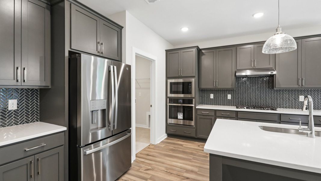 Representative furnished interior of a home built from the Chelsea by DRB Homes in The Park at Brighton, Locust Grove (Image 14).