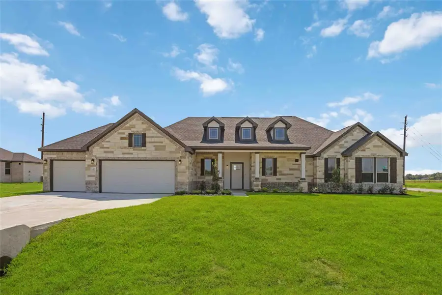 Front exterior of a new home in Blue Heron Estates, Beasley, TX, highlighting curb appeal (Image 2). Front exterior of a new home in Blue Heron Estates, Beasley, TX, highlighting curb appeal (Image 2).