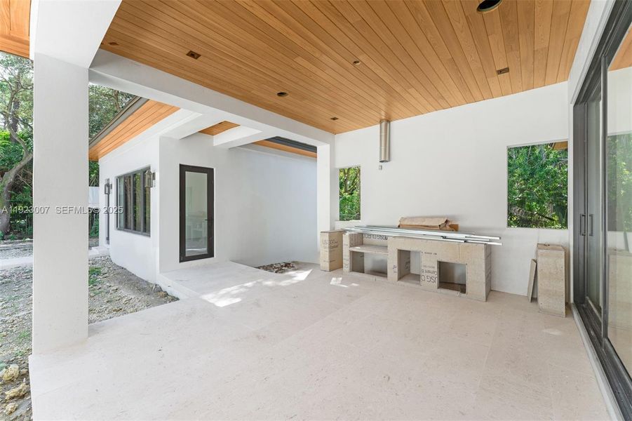 Exterior details and patio area of a home in , Pinecrest (Image 3). Exterior details and patio area of a home in , Pinecrest (Image 3).