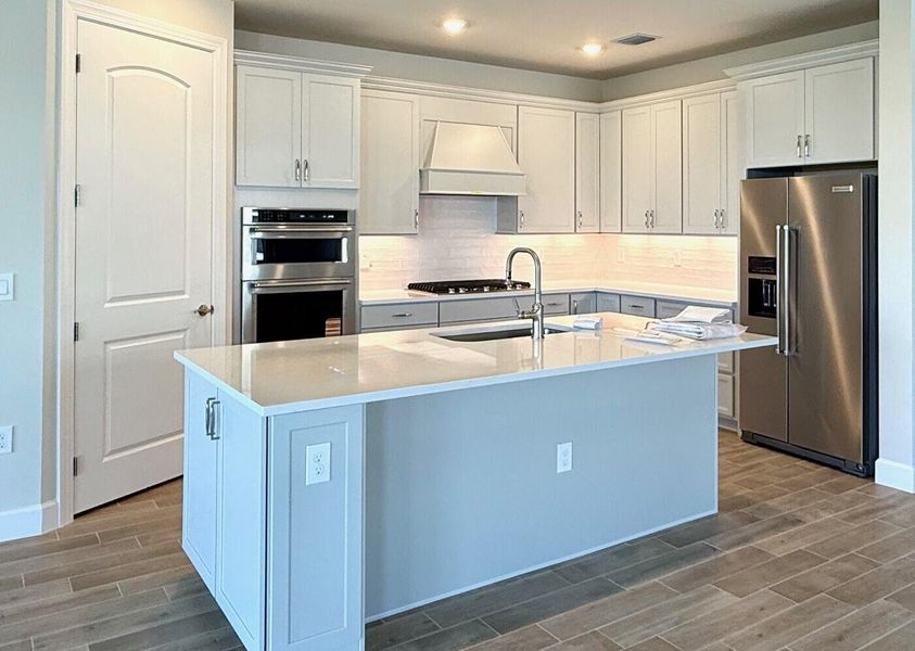 Furnished interior view inside a new home in Del Webb Tradition, Port St. Lucie (Image 11).