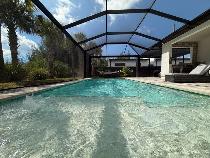 Exterior details and patio area of a home in , Cape Coral (Image 24).