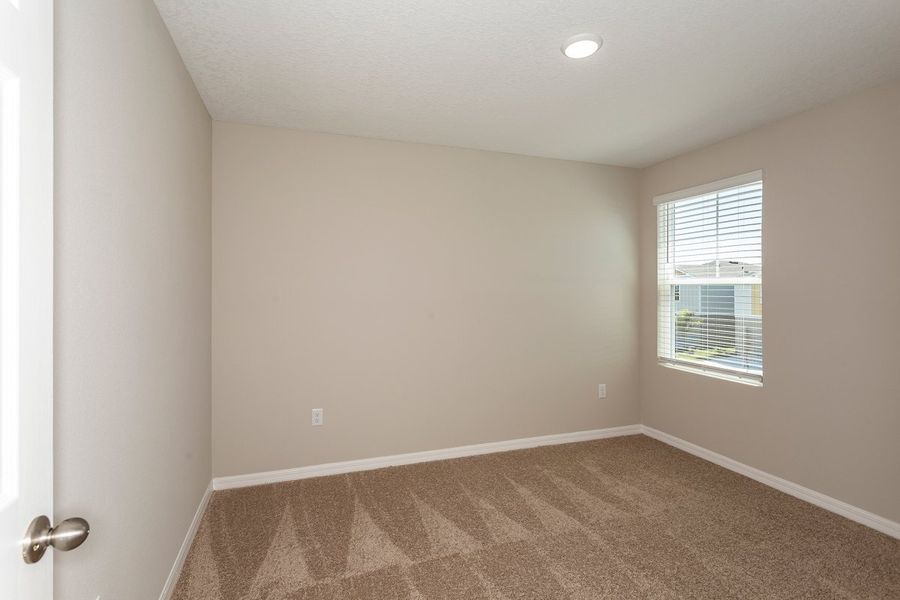 Spacious, unfurnished interior of a new home in Scenic Terrace, Haines City (Image 18).