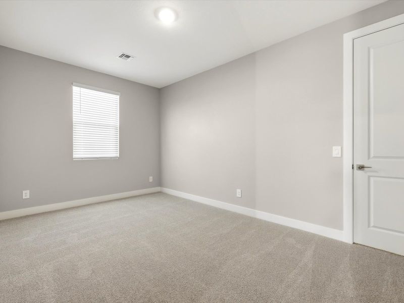 Spacious, unfurnished interior of a new home in White Tank Foothills Signature Series, Waddell (Image 9).