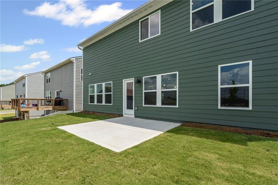 Front exterior of a new home in Crossvine Estates, Braselton, GA, highlighting curb appeal (Image 2).