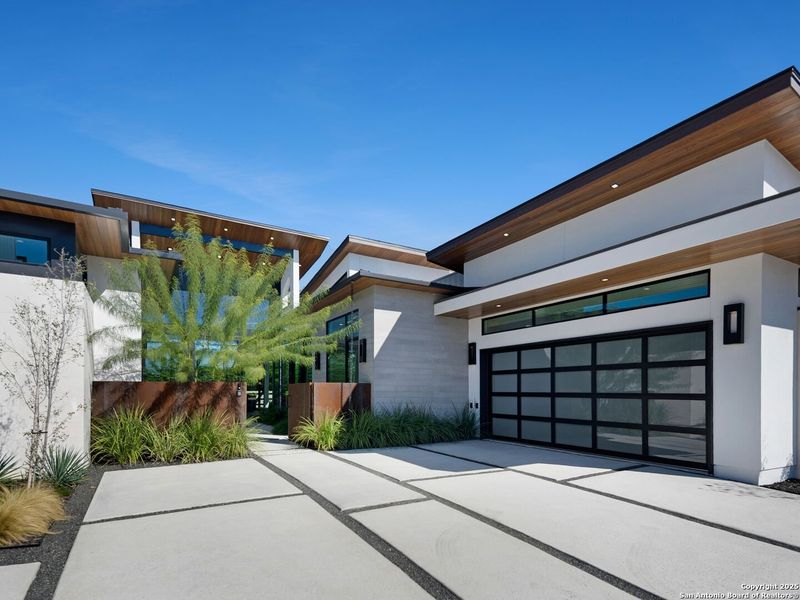 Front exterior of a new home in , San Antonio, TX, highlighting curb appeal (Image 24).