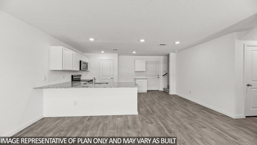 Furnished interior view inside a new home in Castles Edge, Willis (Image 5).
