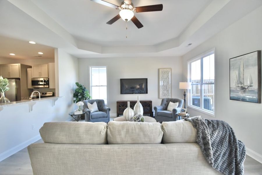 Representative furnished interior of a home built from the Isla by Stevens Fine Homes in Parkwood Estates, Leland (Image 11).