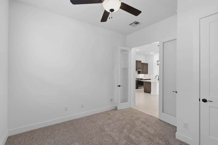 Representative unfurnished interior of a home built from the Palmer by Chesmar Homes in Riceland Alley Loads, Mont Belvieu (Image 20).