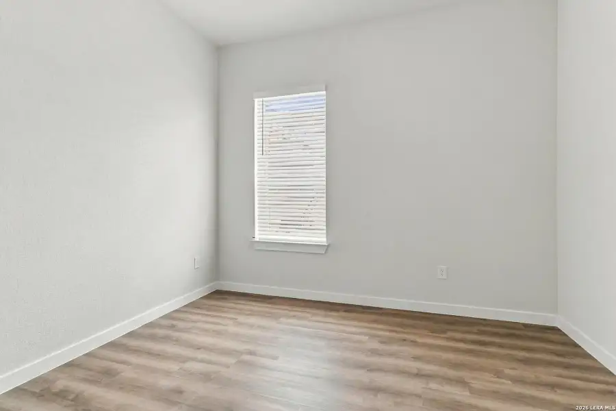 Spacious, unfurnished interior of a new home in Hunters Ranch, San Antonio (Image 14).