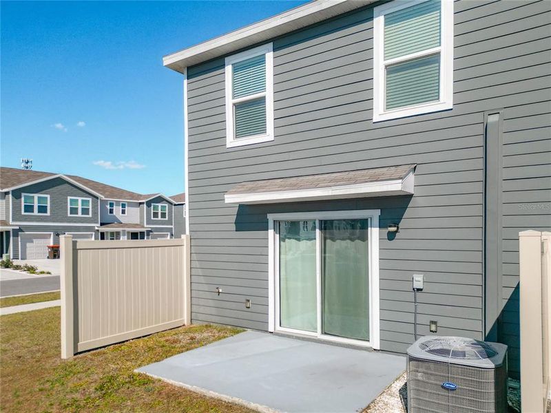Exterior details and patio area of a home in The Towns at Laurel Commons, Ocala (Image 26).