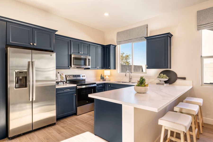 Representative furnished interior of a home built from the Gardenia Plan 5009 by Tri Pointe Homes in Abel Ranch, Goodyear (Image 12).