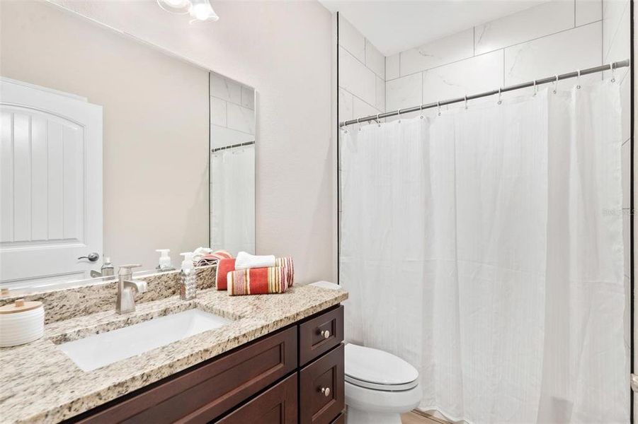 Guest Bathroom with Tub and Shower Combo