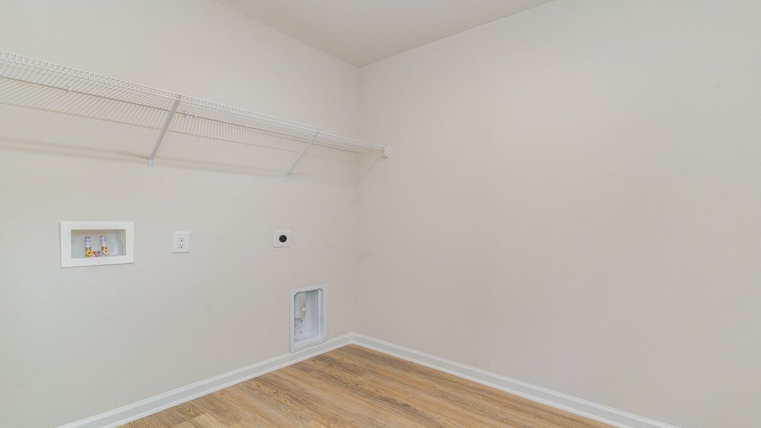 Representative unfurnished interior of a home built from the ROBIE by D.R. Horton in Sandridge Park, Little River (Image 22).