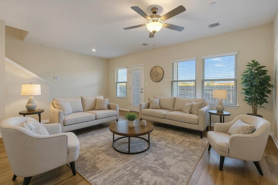 Virtually Staged: Living area with wood finished floors, recessed lighting, and a ceiling fan Virtually Staged: Living area with wood finished floors, recessed lighting, and a ceiling fan