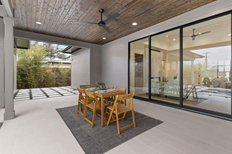 View of patio / terrace with a ceiling fan and outdoor dining space