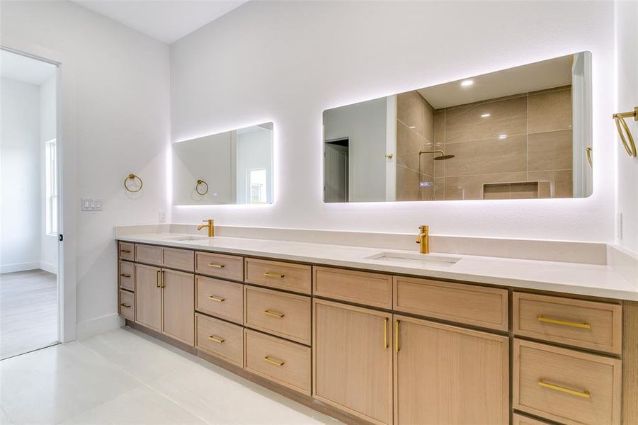 Bathroom with double vanity and a tile shower Bathroom with double vanity and a tile shower