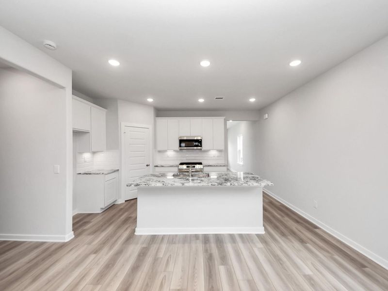 Furnished interior view inside a new home in Windmill Estates, Magnolia (Image 4).
