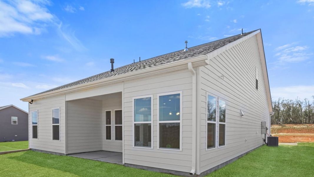 Exterior details and patio area of a home in Whitehawk Meadows, Travelers Rest (Image 3).