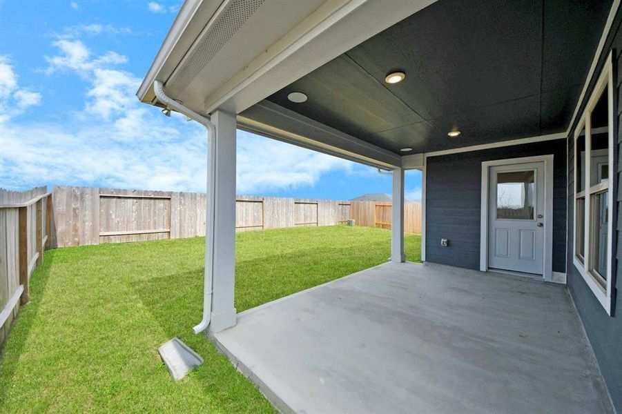 Exterior details and patio area of a home in Sweetgrass Village, Crosby (Image 3).