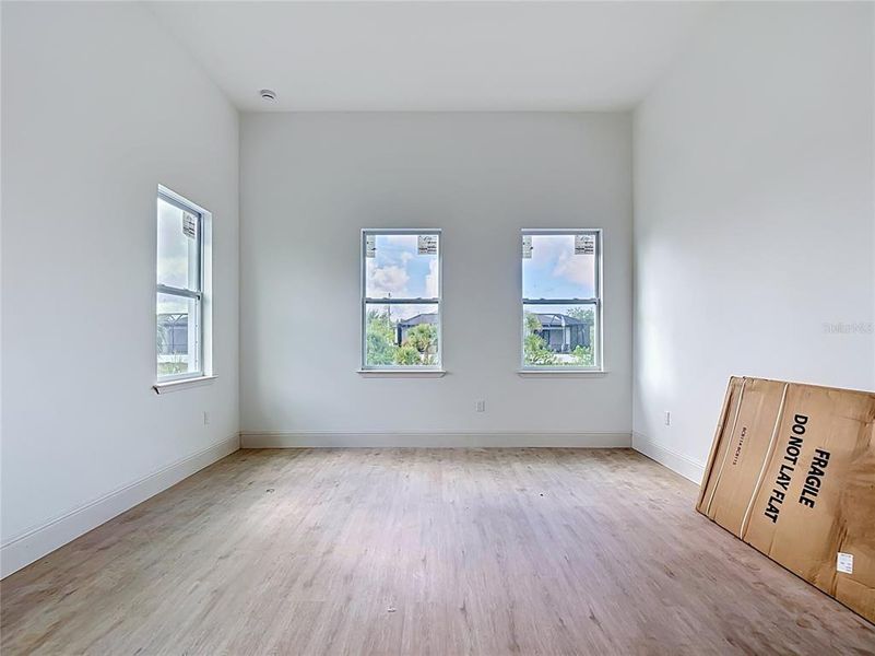 Spacious, unfurnished interior of a new home in , Port Charlotte (Image 31).