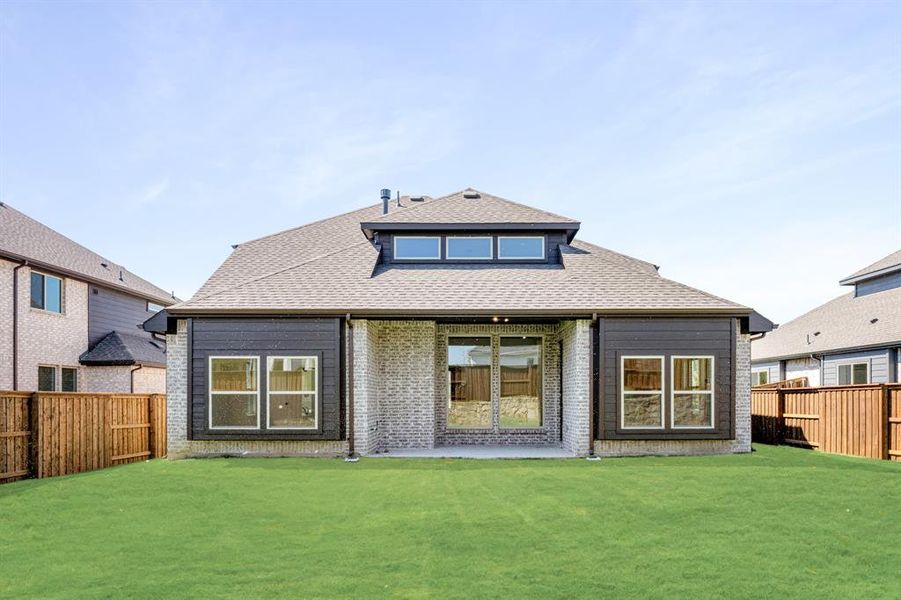 Exterior details and patio area of a home in Windsong Ranch Classic 61, Prosper (Image 3). Exterior details and patio area of a home in Windsong Ranch Classic 61, Prosper (Image 3).