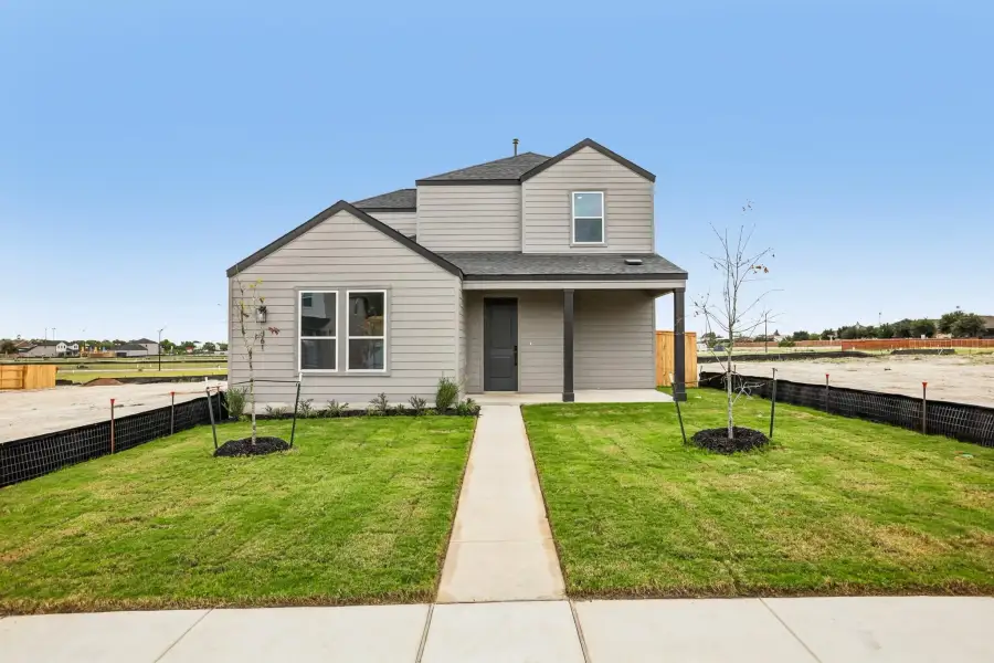 Front exterior of a new home in Parkton Square, Kyle, TX, highlighting curb appeal (Image 19).