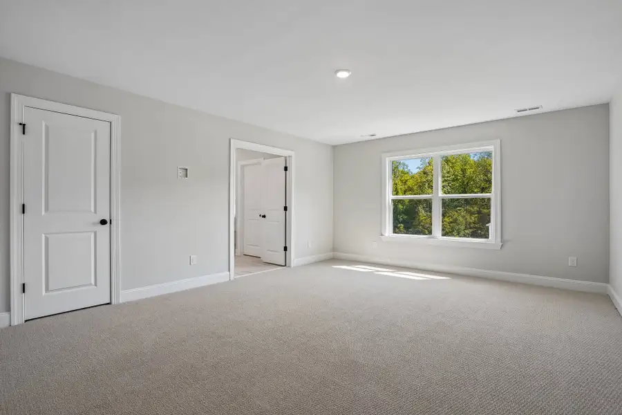 Representative unfurnished interior of a home built from the Fontana by Caruso Homes in Blue Run, Raleigh (Image 31).