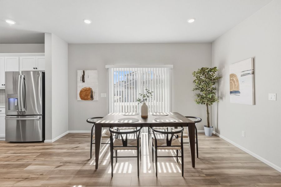 Furnished interior view inside a new home in Woodrose at Painted Prairie, Aurora (Image 6).