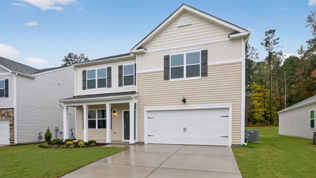 Representative exterior photo of a completed home built from the WILMINGTON by D.R. Horton in Galvins Ridge, Sanford, NC (Image 24).