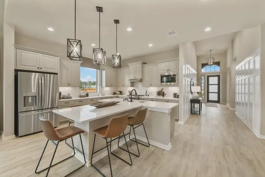 Representative furnished interior of a home built from the Lynnbrook by Chesmar Homes in The Trails, New Caney (Image 7).