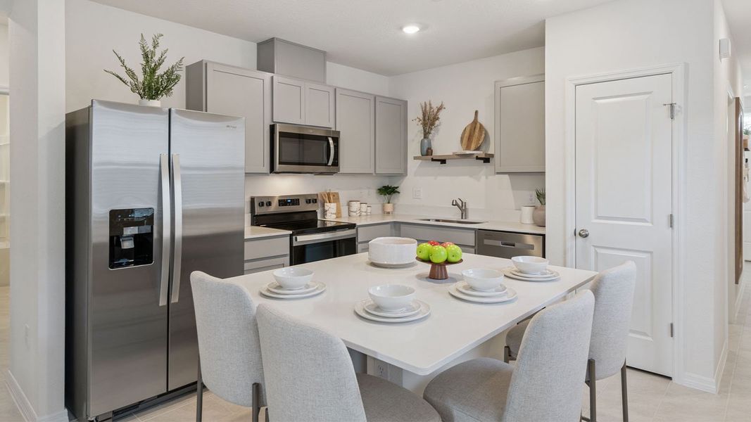 Representative furnished interior of a home built from the DOWNING II by D.R. Horton in Magnolia Pointe, Umatilla (Image 6). Representative furnished interior of a home built from the DOWNING II by D.R. Horton in Magnolia Pointe, Umatilla (Image 6).
