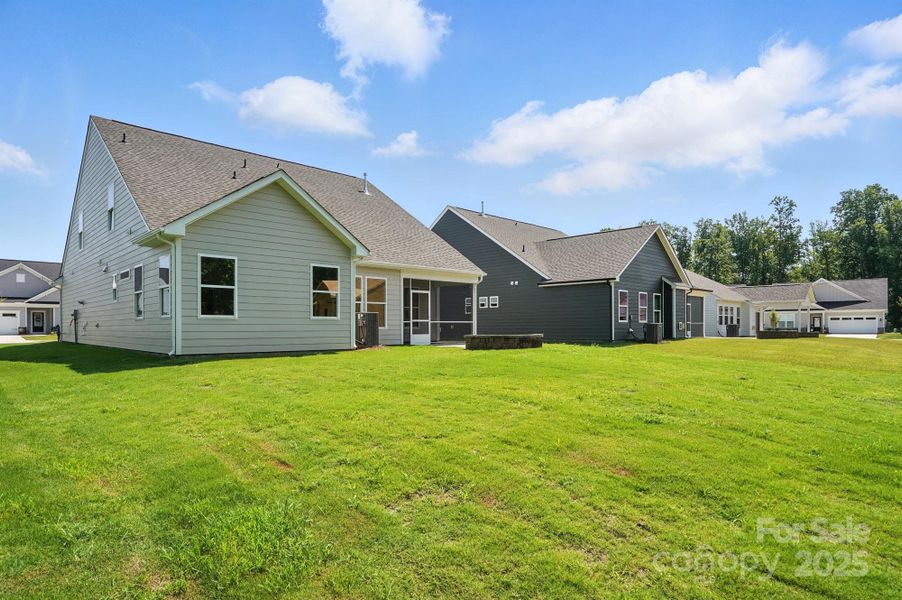 Front exterior of a new home in Heritage - 55+ Community, Indian Trail, NC, highlighting curb appeal (Image 19).